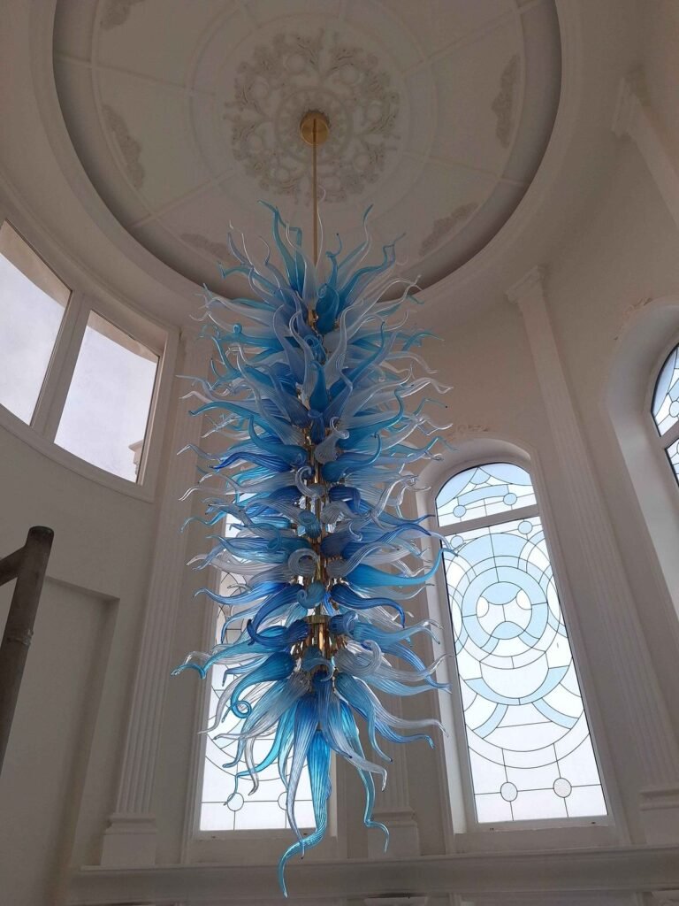 Electrical Work Luxury Cascading Glass Chandelier in Qatar - Rahman Maintenance Qatar